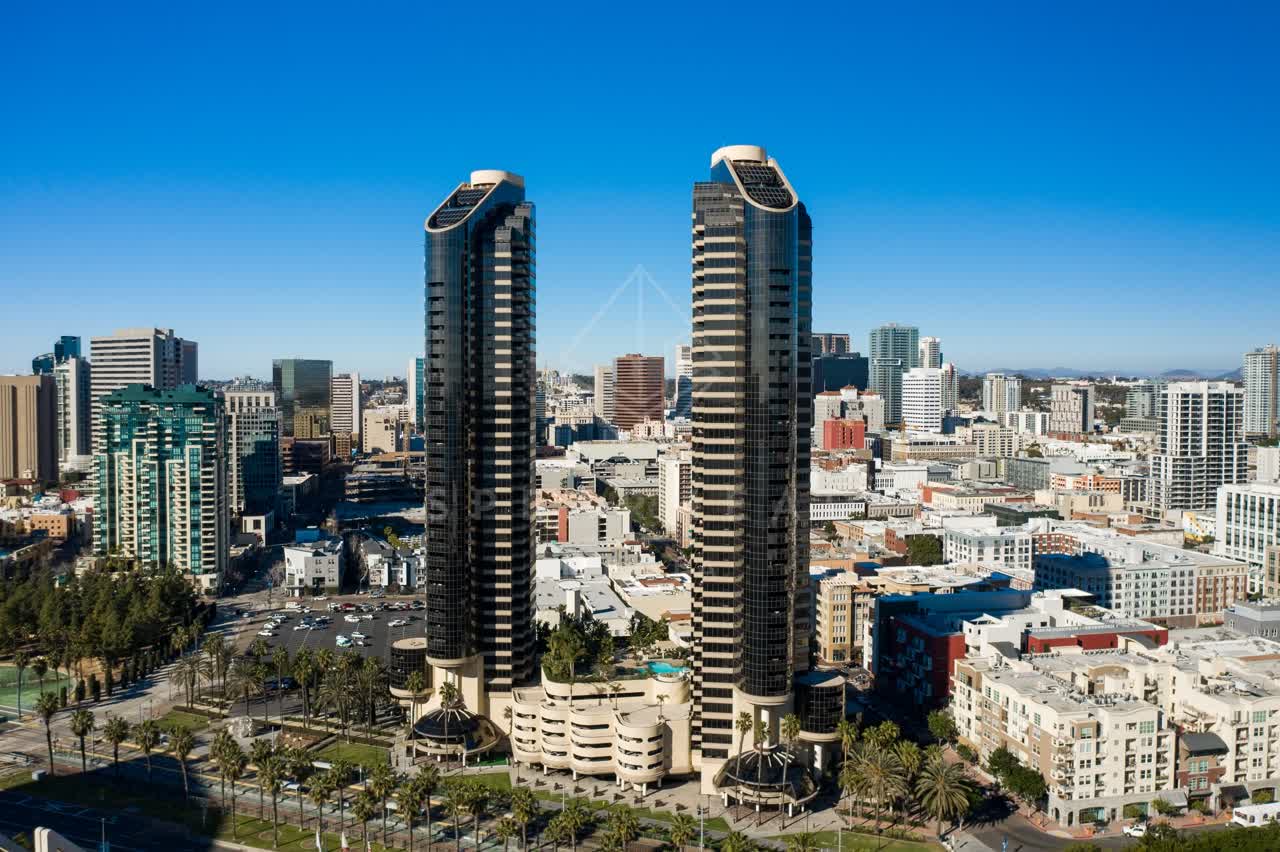 Aerial view of the downtown streets, the skyline and palm trees at San Diego Marina.