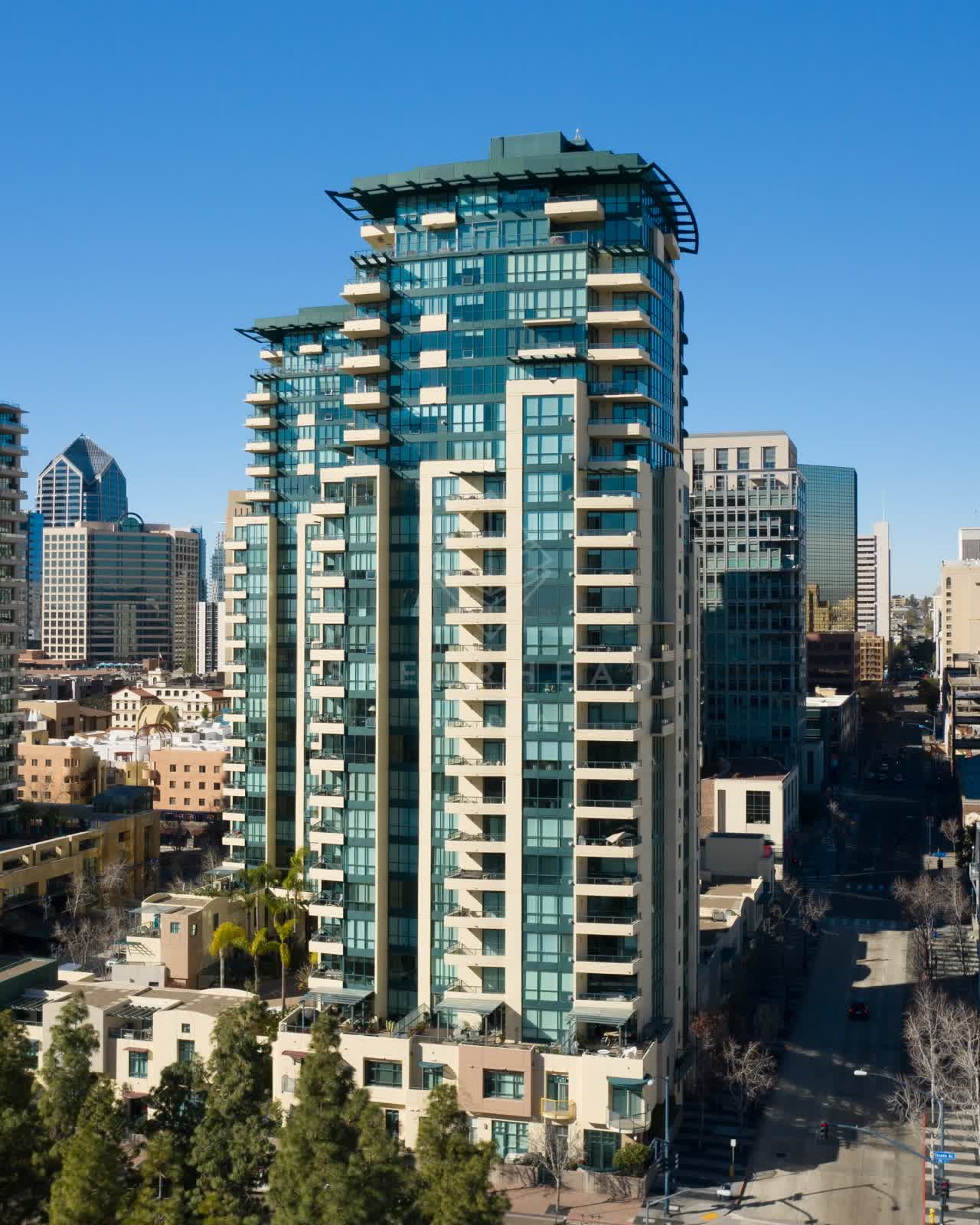 Aerial view of the downtown streets, the skyline and palm trees at San Diego Marina.
