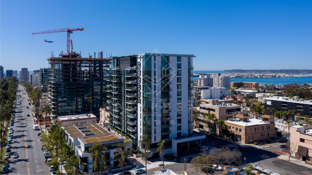 Aerial view of the downtown streets, palm trees and the bay at Bankers Hill.