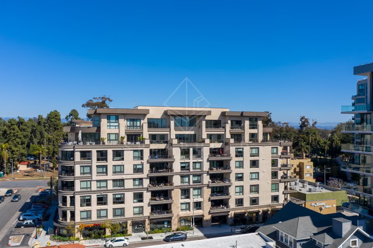 Aerial view of a residential street, homes and the buildings at Bankers Hill.