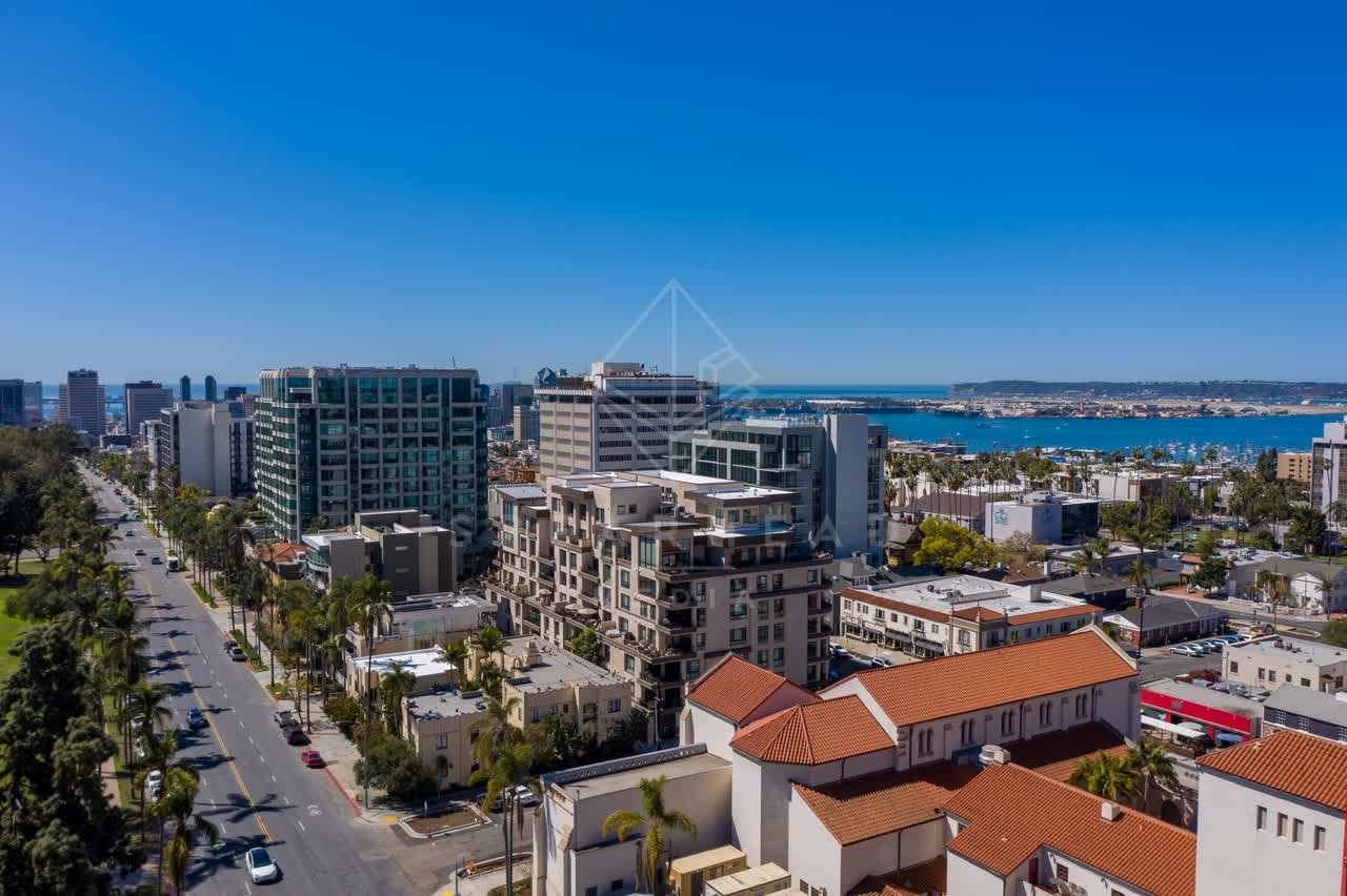 Aerial view of the downtown streets, the skyline and boats at Bankers Hill.