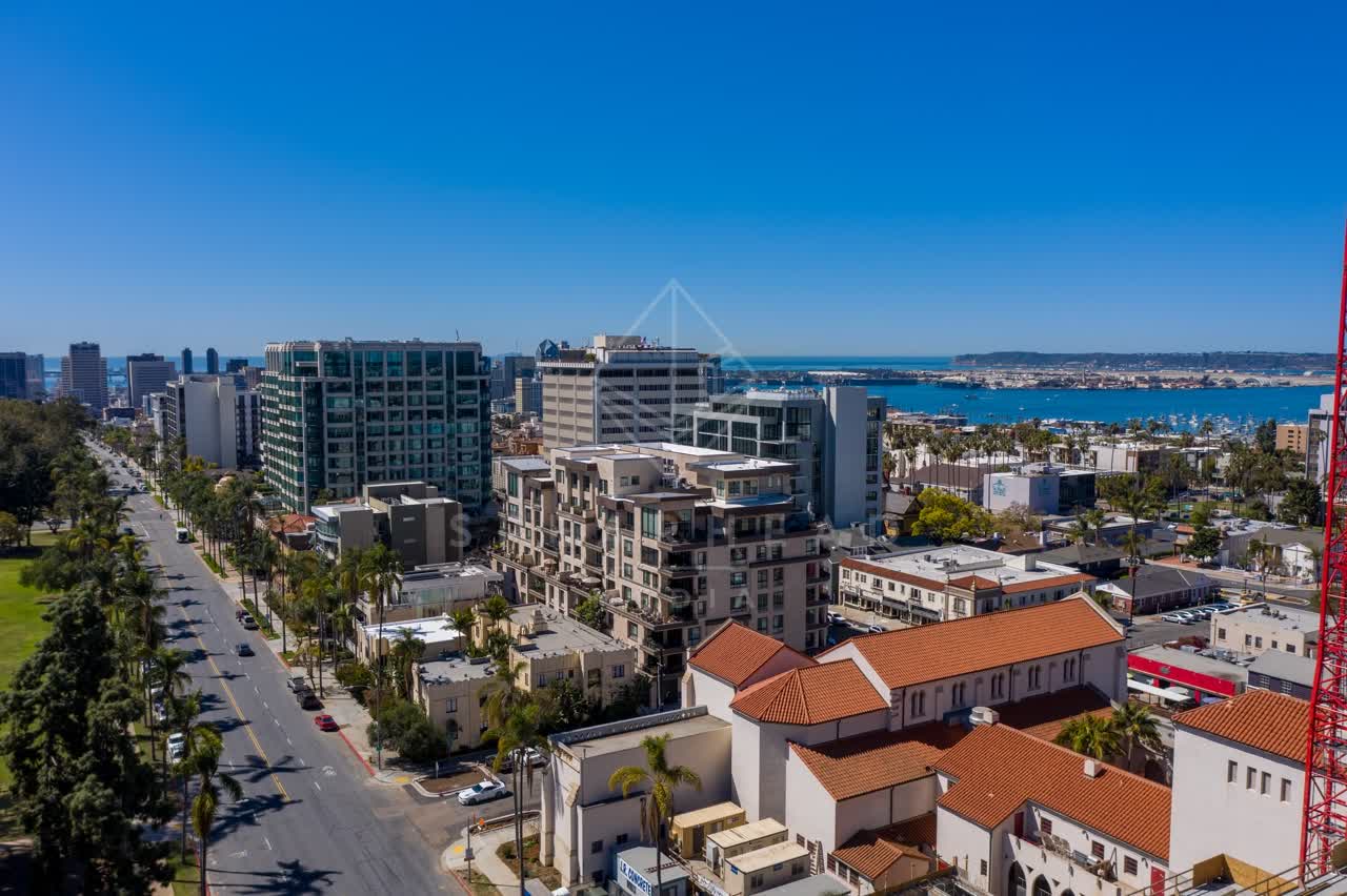Aerial view of the downtown streets, the skyline and boats at Bankers Hill.