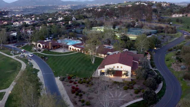 Aerial view of a residential street, homes and the buildings in Santaluz.