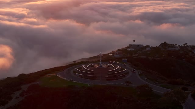 Aerial view of the cliffs, palm trees and homes at Mount Soledad.