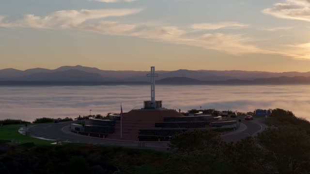 Elevated view of the cliffs, traffic and open country at Mount Soledad.