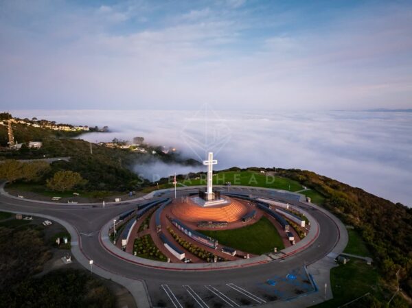 Mount Soledad and the Mt. Soledad National Veterans Memorial over the clouds and fog during sunrise in La Jolla | Drone Photo - 10