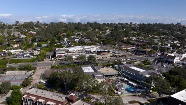 Aerial view of a residential street, homes and the buildings at Powerhouse Park.