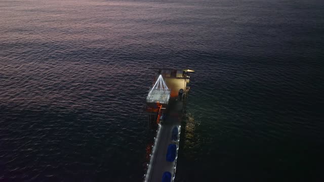Aerial view of the beach, the pier and the ocean at La Jolla Shores.
