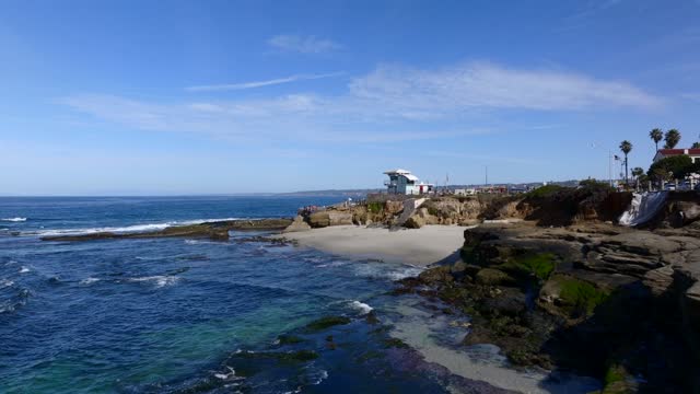 Aerial shot of Children’s Pool in La Jolla on a beautiful Day with Blue Skies | Drone Video – 1