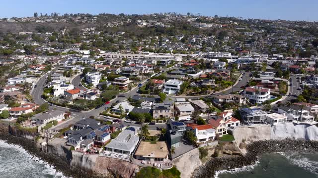 Aerial shot of the Bird Rock Neighborhood in La Jolla on a beautiful Day with Blue Skies | Drone Video