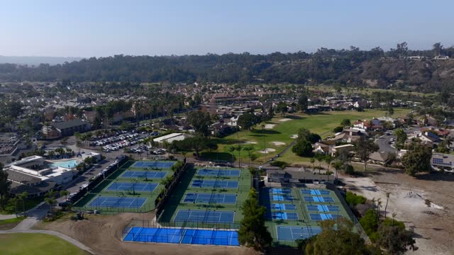 Aerial view of a residential street, homes and traffic in Rancho Santa Fe.