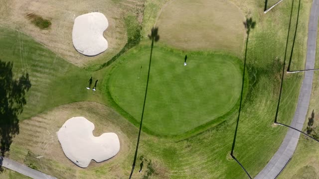 Aerial view of a park and open country in Rancho Santa Fe, with people walking.