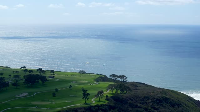 The Iconic Torrey Pines Golf Course in La Jolla looking over the beach and Pacific Ocean | Drone Video – 1