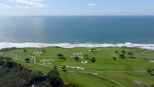 The Iconic Torrey Pines Golf Course in La Jolla looking over the beach and Pacific Ocean | Drone Video – 3