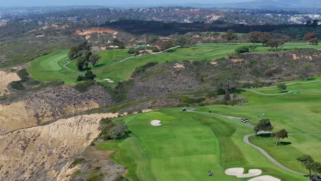 The Iconic Torrey Pines Golf Course in La Jolla looking over the beach and Pacific Ocean | Drone Video – 5