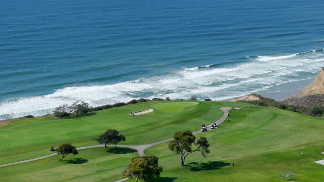 The Iconic Torrey Pines Golf Course in La Jolla looking over the beach and Pacific Ocean | Drone Video – 7