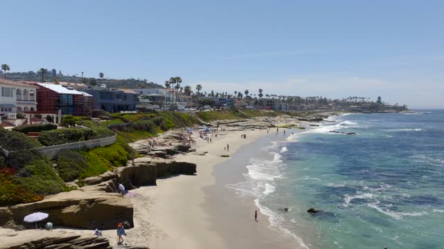 A beautiful day and Windansea Beach in the Beach Barber Tract neighborhood in La Jolla | Drone Video – 2