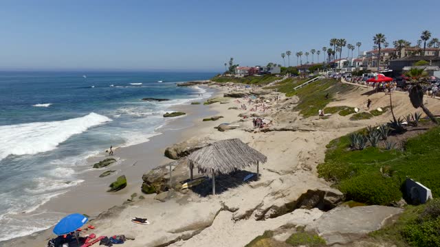 A beautiful day and Windansea Beach in the Beach Barber Tract neighborhood in La Jolla | Drone Video – 5