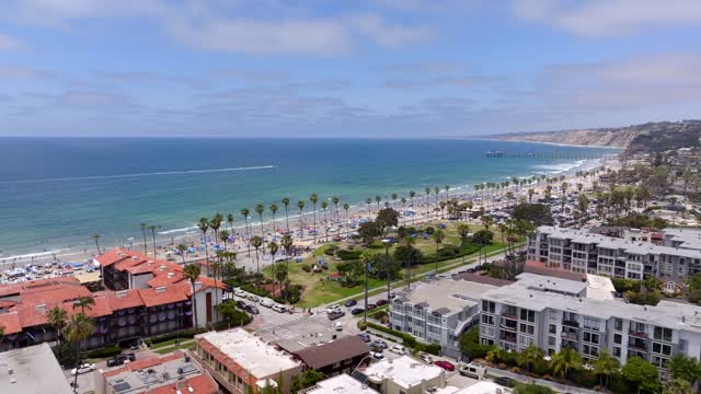 Aerial footage of a beach day at La Jolla Shores with crowds enjoying the sun | Drone Video – 7