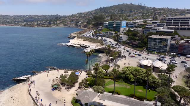 Aerial footage La Jolla Cove and Ellen Scripps Browning Park on a sunny day | Drone Video