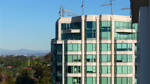 Low aerial view of the downtown streets, the buildings and the city at Bankers Hill.