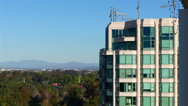 Low aerial view of the downtown streets, the buildings and the city at Bankers Hill.