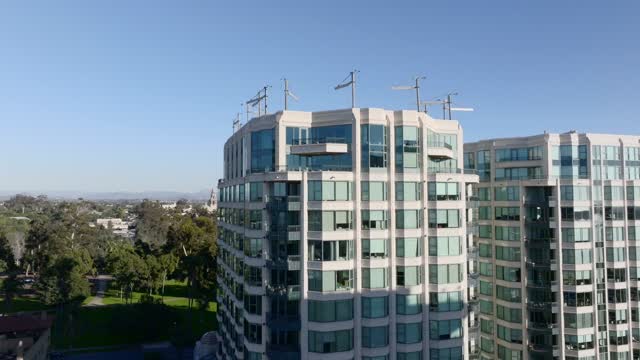 Low aerial view of the downtown streets, the buildings and the city at Bankers Hill.