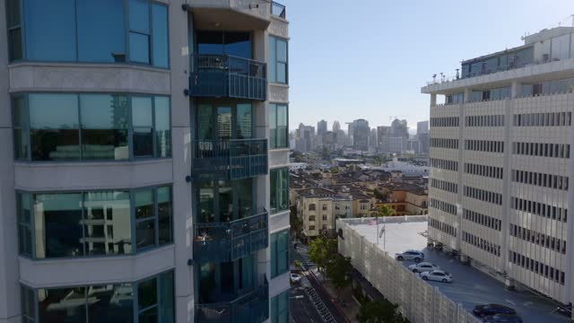 Low aerial view of the downtown streets, the skyline and the buildings at Bankers Hill.