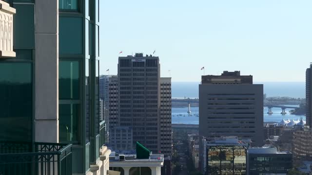 Elevated view of the downtown streets, the bridge and the skyline at Bankers Hill.