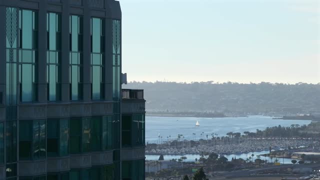 Elevated view of the downtown streets, boats and palm trees at Bankers Hill, with boats out.