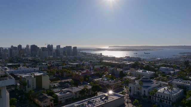 Aerial view of the downtown streets, the skyline and boats at Bankers Hill.