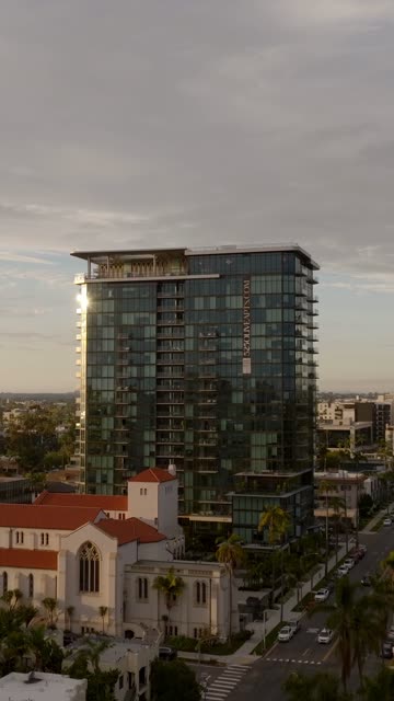 Aerial footage of the 525 Olive Building during a beautiful sunset over Bankers Hill | Vertical Drone Video