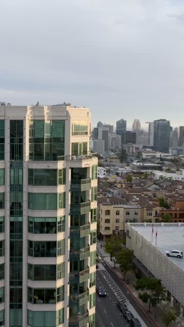 Aerial footage of the Park Laurel Building during a beautiful sunset over Balboa Park and Bankers Hill | Vertical Drone Video