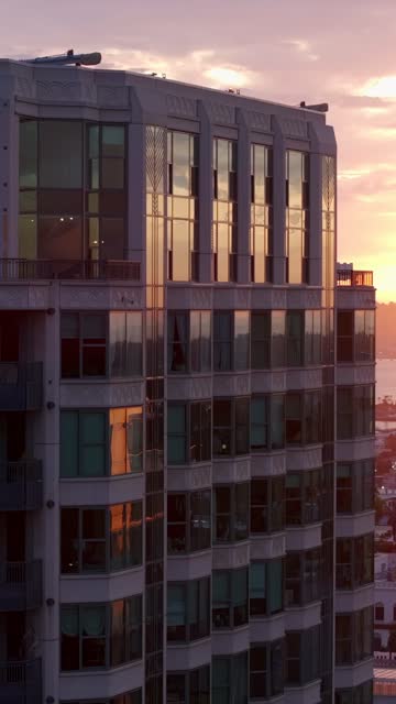 Aerial footage of the Park Laurel Building during a beautiful sunset over Balboa Park and Bankers Hill | Vertical Drone Video – 4