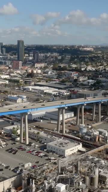 Aerial view of the downtown streets, the bridge and the skyline in Barrio Logan.