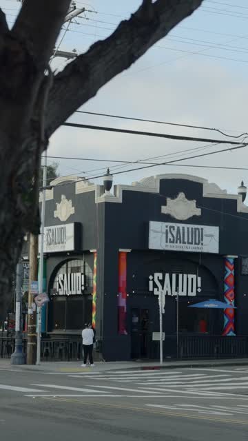 The downtown streets, homes and the buildings in Barrio Logan, with people walking.
