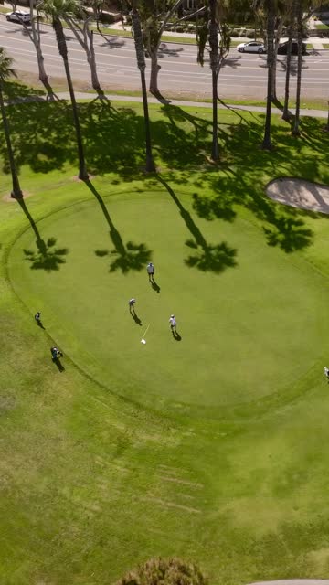 The Coronado Golf Course and Coronado Bridge on Glorietta Bay on a beaitiful Day | Vertical Drone Video – 2