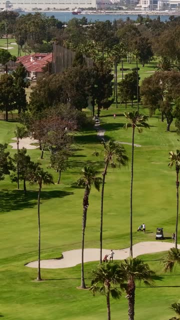 The Coronado Golf Course and Coronado Bridge on Glorietta Bay on a beaitiful Day | Vertical Drone Video – 4