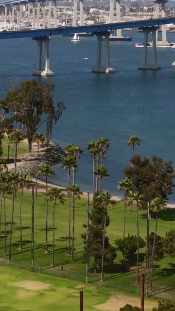 The Coronado Golf Course and Coronado Bridge on Glorietta Bay on a beaitiful Day | Vertical Drone Video – 6