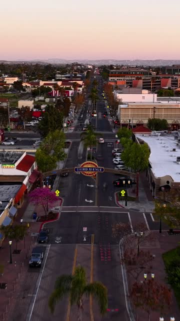 Shot of downtown Chula Vista and the Third Avenue Sign with the Restaurants and Shops | Vertical Drone Video – 9