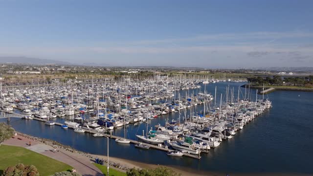 Aerial view of the harbor, boats and the bay in Chula Vista, with boats out.