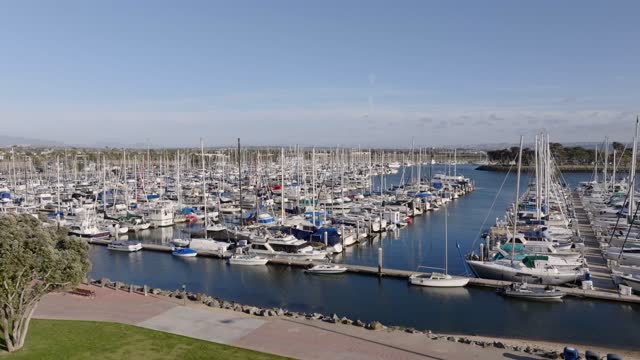 Low aerial view of the harbor, boats and the bay in Chula Vista.