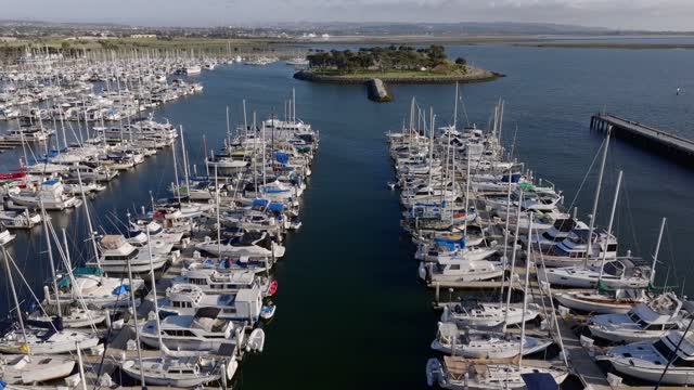 Aerial view of the harbor, boats and the bay in Chula Vista, with boats out.