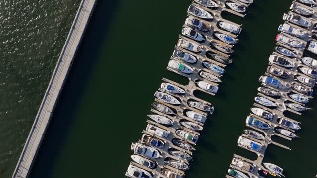 Aerial view of the harbor, boats and the bay in Chula Vista, with boats out.