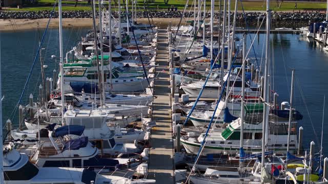 Low aerial view of the harbor, boats and the bay in Chula Vista.