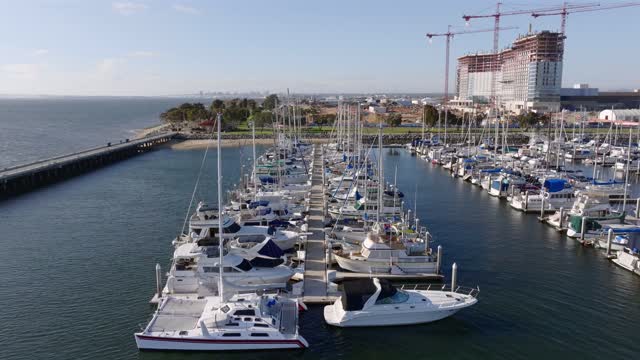 Low aerial view of the harbor, boats and the bay in Chula Vista.