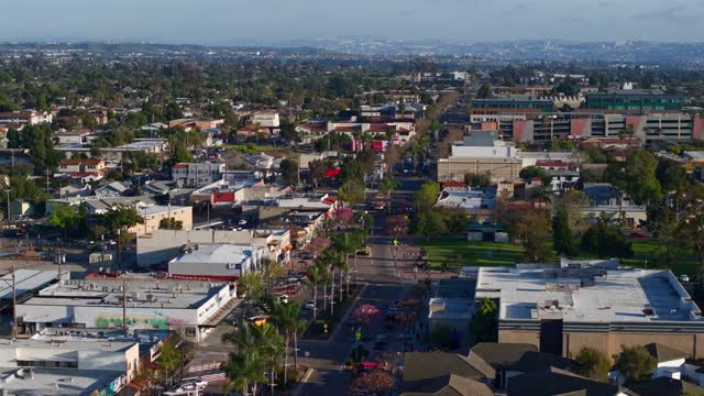 Aerial view of the downtown streets, palm trees and homes in Chula Vista.