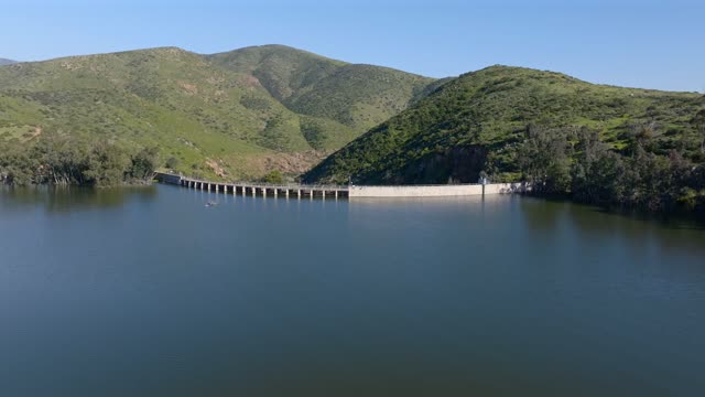 Low aerial view of the country inland, open country and the water in Chula Vista.