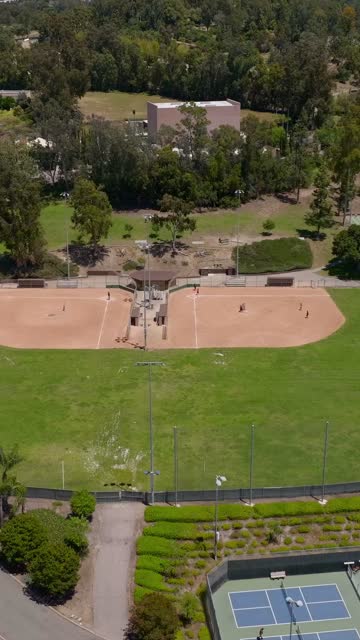 Scenic flyover of Moonlight Amphitheatre in Vista on a bright summer afternoon | Vertical Drone Video – 2