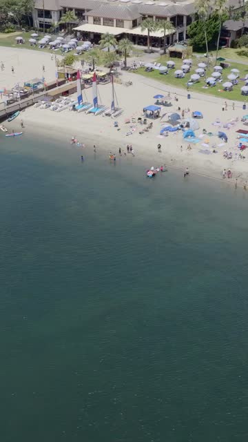 Mission Bay on the 4th of July with crowds enjoying the beach and water in the San Diego sun